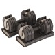 Verstelbare dumbbells van Centr met een bereik van 2.3 tot 22.5 kg en ergonomische handgrepen. Inclusief digitale coaching via Centr app.