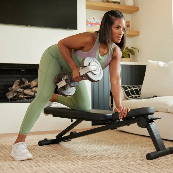 Verstelbare dumbbells van Centr met een bereik van 2.3 tot 22.5 kg en ergonomische handgrepen. Inclusief digitale coaching via Centr app.