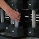 Centr Fusion Bench met verstelbare posities voor veelzijdige workouts en opbergruimte voor dumbbells, ideaal voor thuisgym.