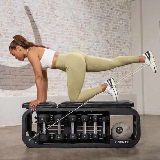 Centr Fusion Bench met verstelbare posities voor veelzijdige workouts en opbergruimte voor dumbbells, ideaal voor thuisgym.