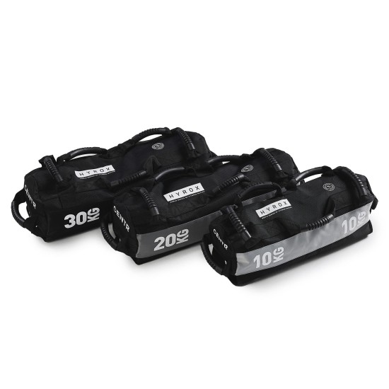 Verbeter je training met de 10 kg Centr x HYROX Sandbag. Duurzaam Cordura® nylon, zeven handgrepen en een dubbel Velcro® sluitsysteem voor intensieve workouts.